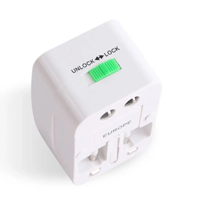 White travel adapter with green lock indicator on a white background