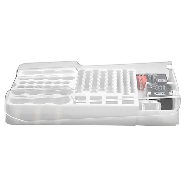 Clear plastic kitchen utensil holder with cutlery on a white background