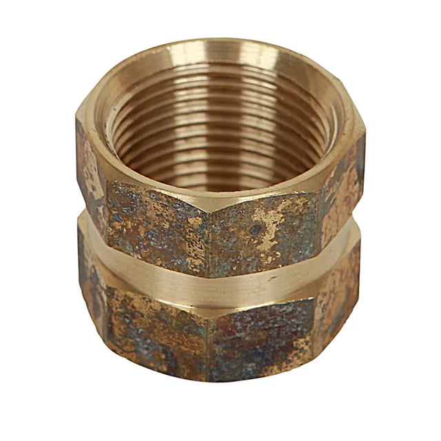 Brass threaded fitting on a white background