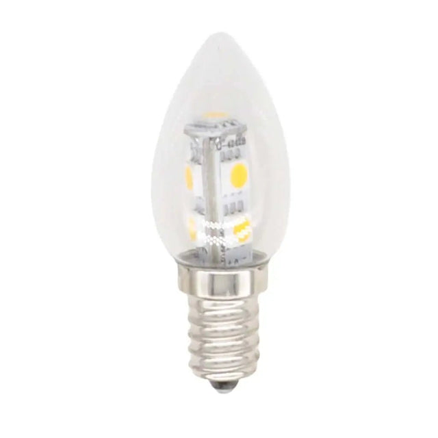 Clear LED candle light bulb on a white background