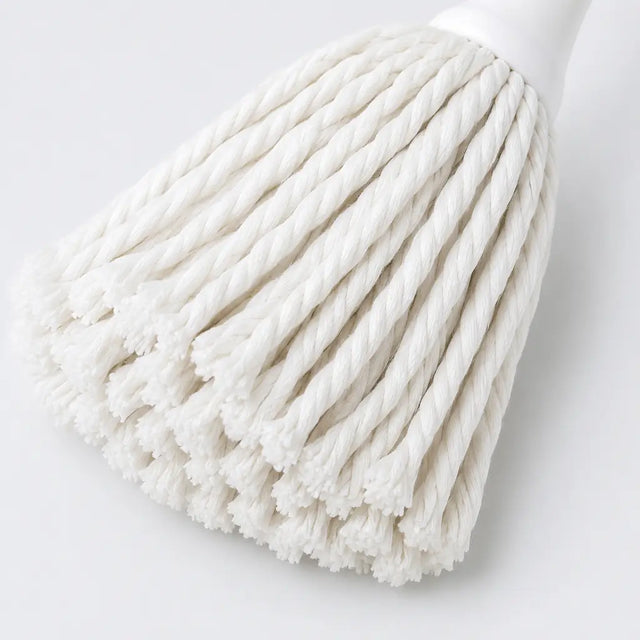 White dish mop head on a light gray background