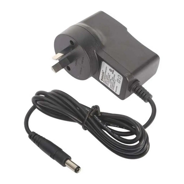 Black power adapter with plug and cable on a white background