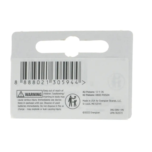 Back of a battery packaging with barcode and warning label on a white background