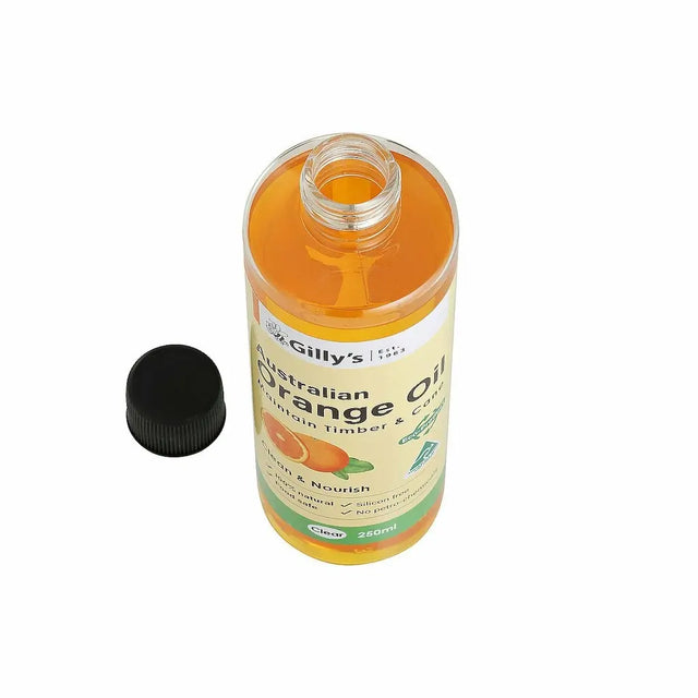 Bottle of Gilly's Australian Orange Oil with a black cap on a white background
