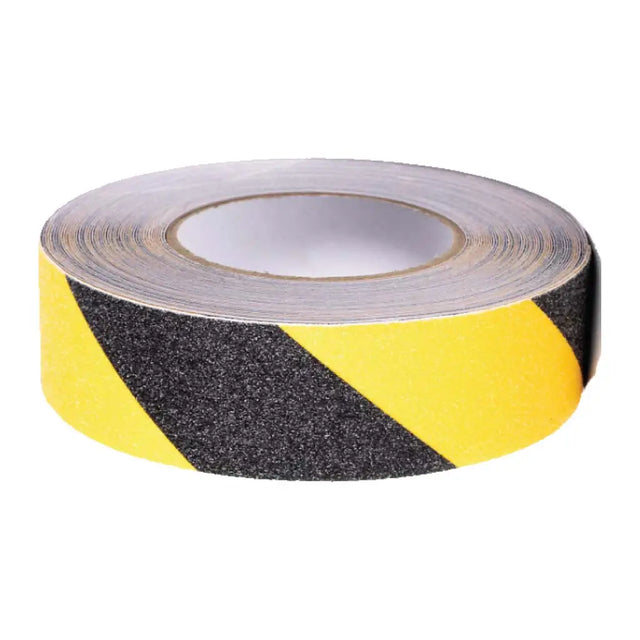Roll of black and yellow striped safety tape on a white background