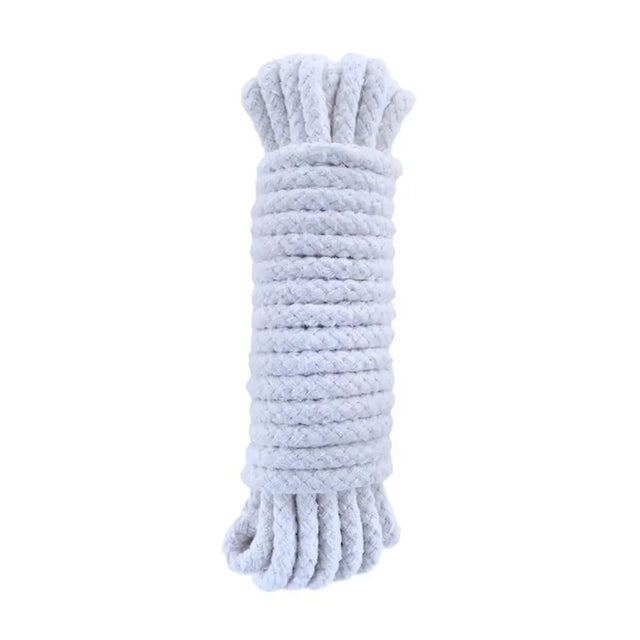 Light blue knitted dog toy on a white background