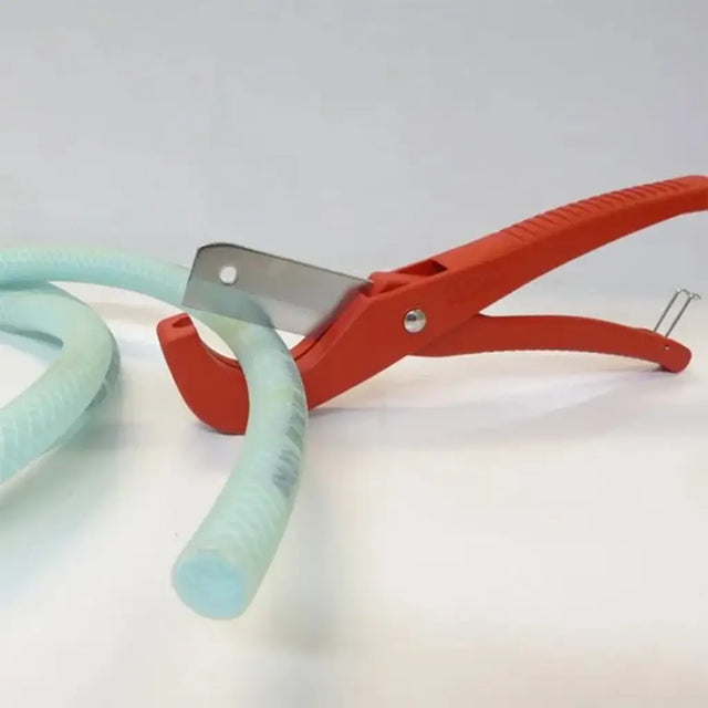 Red pipe cutter with a green hose on a white background