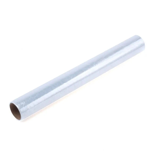 Roll of clear plastic wrap on a white background