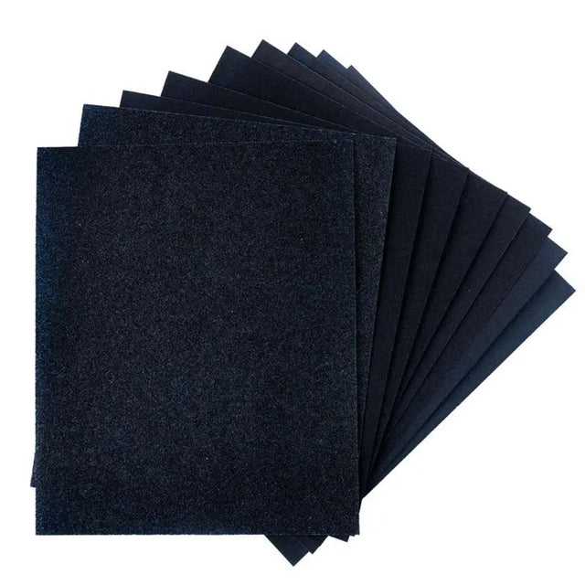 Stack of black sheets on a white background