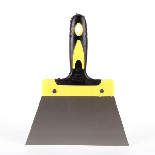 Construction putty knife with black and yellow handle on a white background