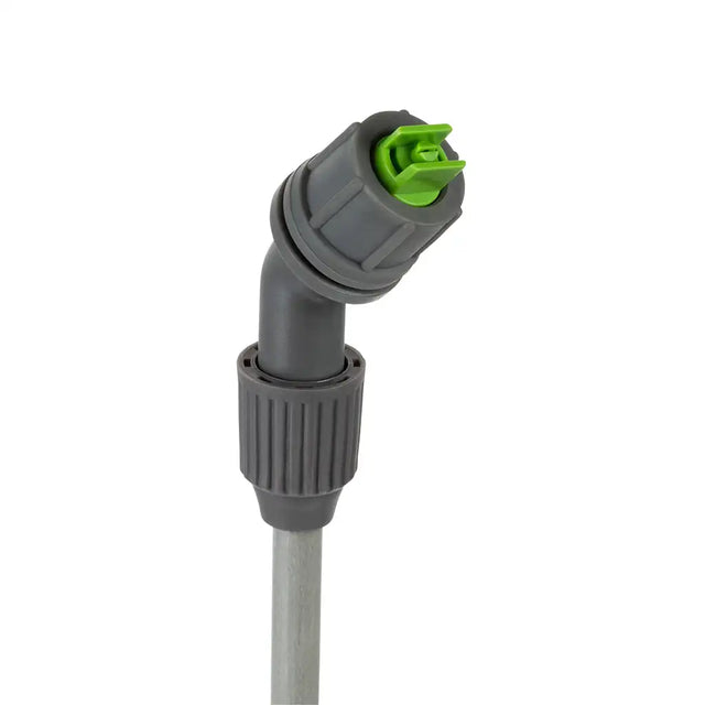 Gray and green compress spray nozzle on a white background