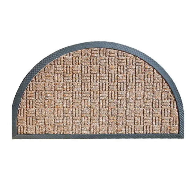 Half-moon shaped doormat with textured surface on a white background