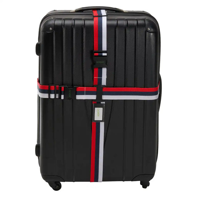 Black suitcase with a colorful strap on a white background