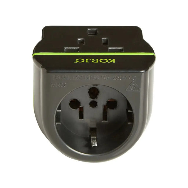 Black travel adapter with green accent on a white background