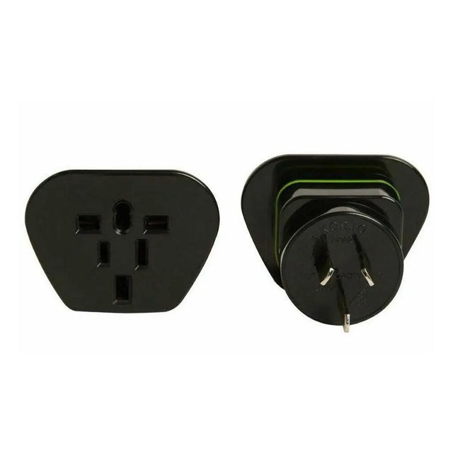 Black travel adapter on a white background
