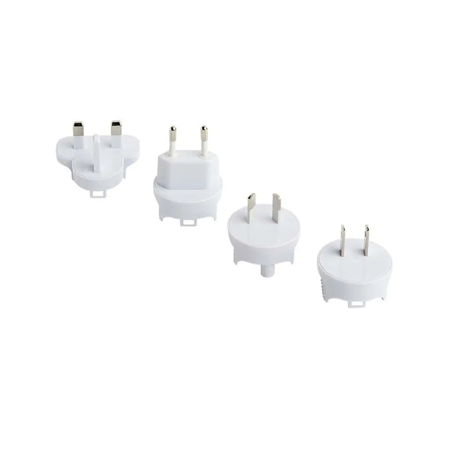 Four white plug adapters on a white background