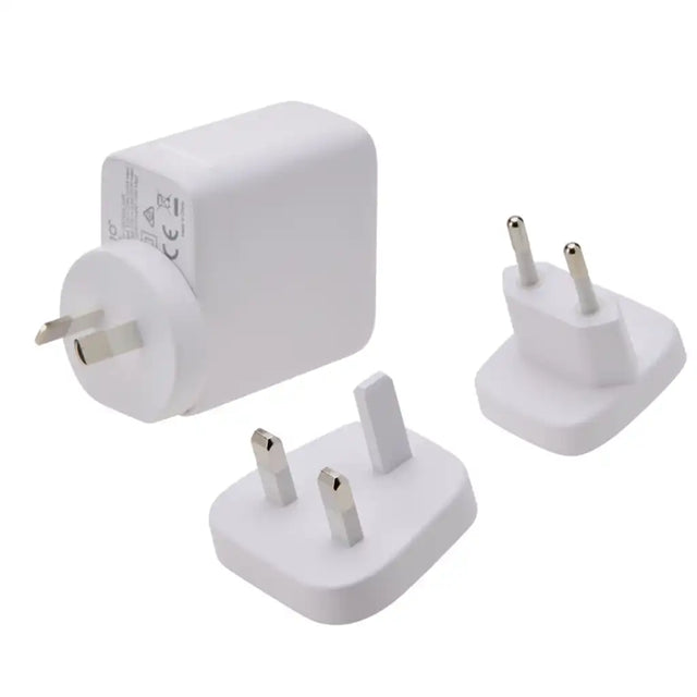 Korjo 4 Port USB Power Hub shown with AUS, UK and EU plug adaptor attachments
