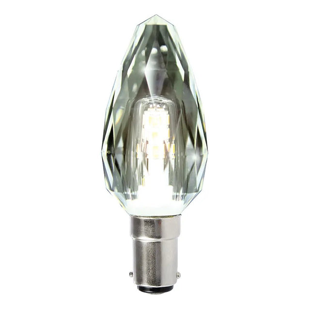 Clear LED light bulb with decorative base on a white background