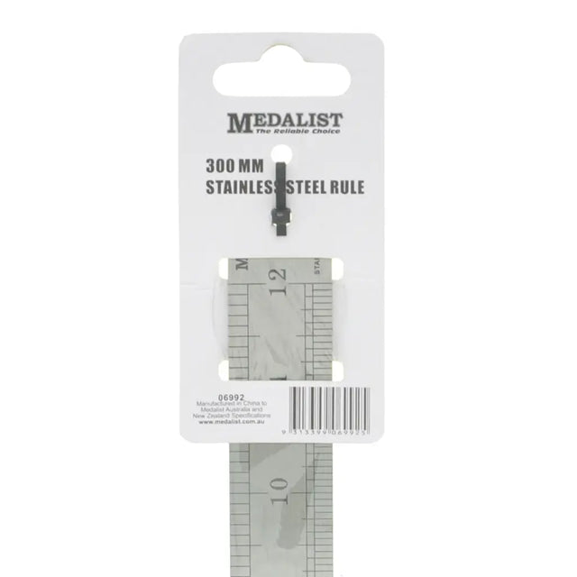 Metal ruler with 'Medalist' packaging on a white background