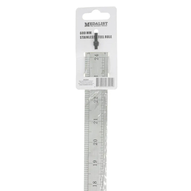 Metal ruler with measurement markings on a white background