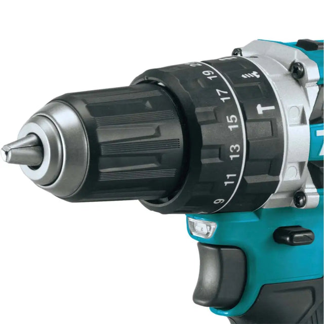 Close-up of a cordless drill with a white background