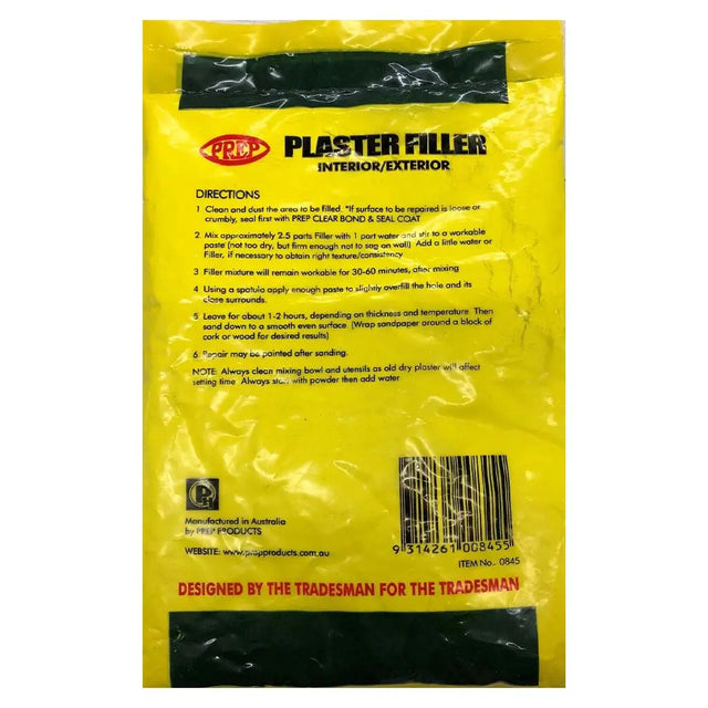 Yellow package of plaster filler with text and branding on a white background