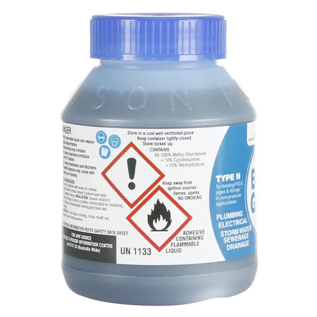Bottle with blue cap and safety label on a white background