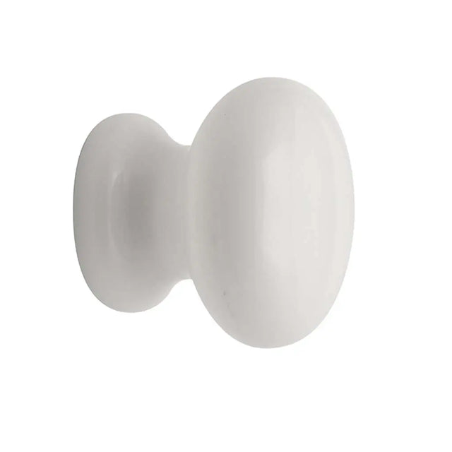 White ceramic knob on a white background