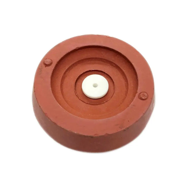 Red rubber wheel with a white center on a white background