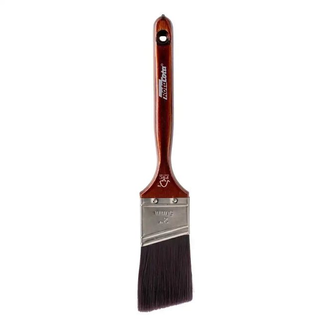 Paint brush with a wooden handle and metal ferrule on a white background