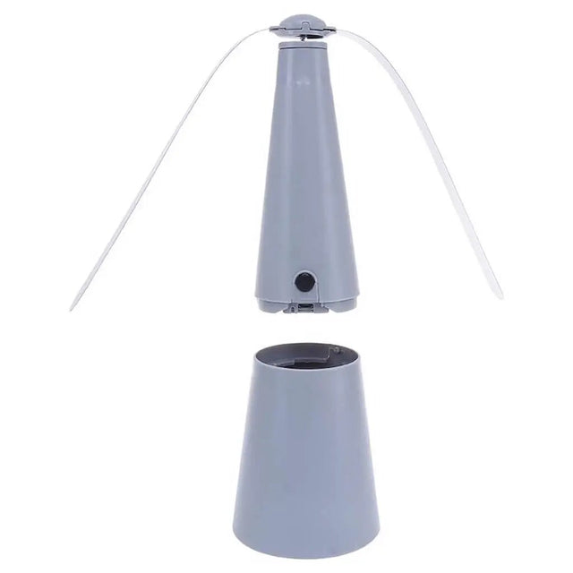 Gray fly fan with stand on a white background