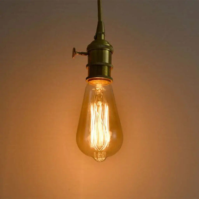 Vintage-style light bulb on a warm background