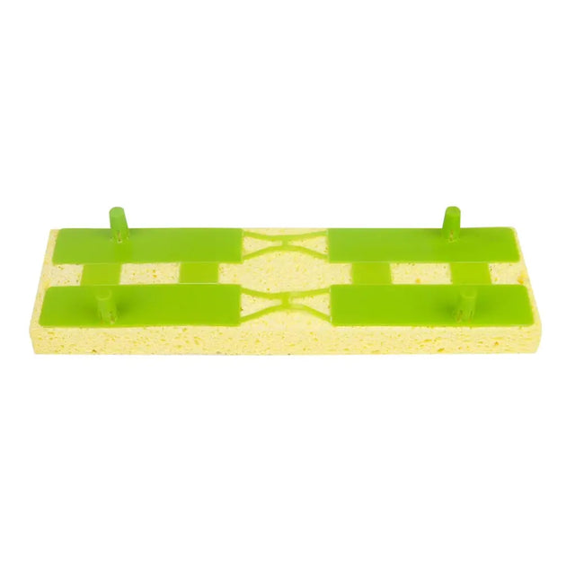 Green and beige sponge with a checkered pattern on a white background