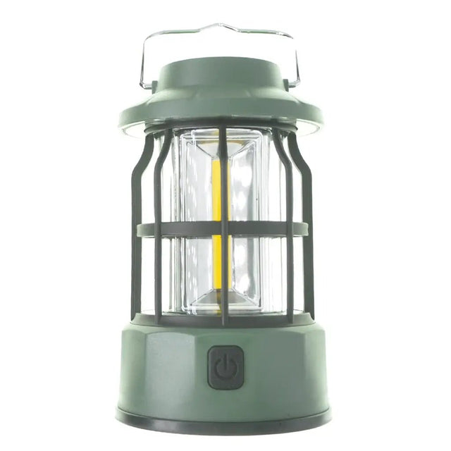 Green lantern with clear glass cover on a white background