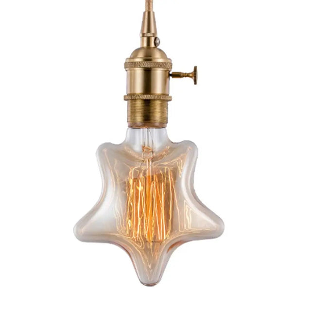 Star-shaped light bulb with brass fixture on a white background