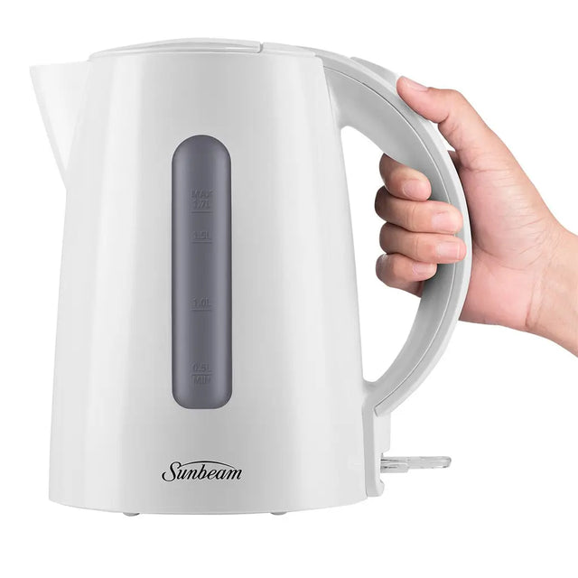 White electric kettle with gray handle held by a hand on a white background, featuring the Sunbeam brand.