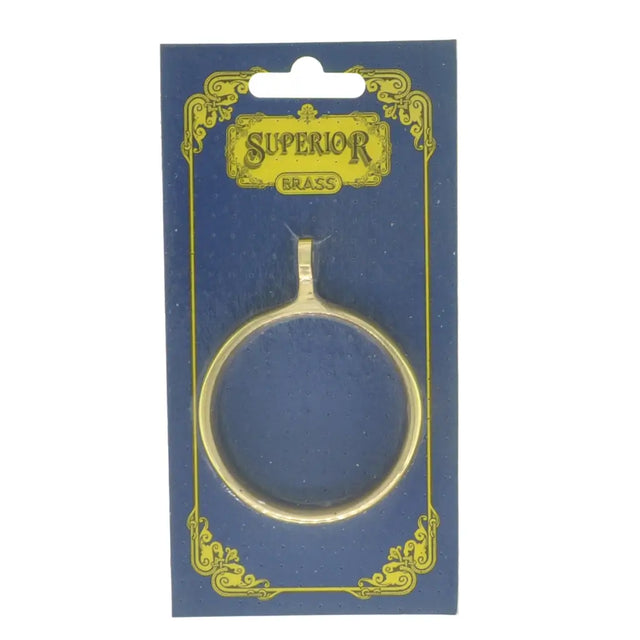 Gold ring on a blue card with 'Superior Brass' branding