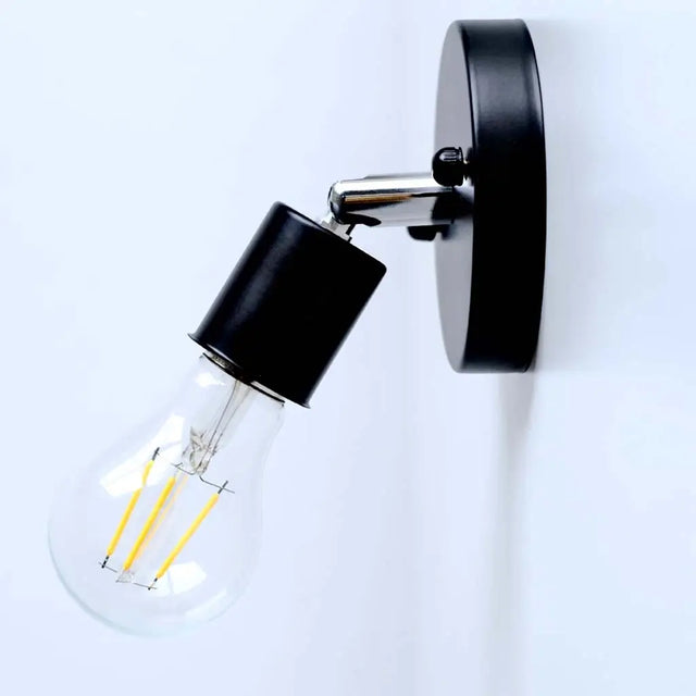 Modern wall-mounted light fixture with a black finish on a white background