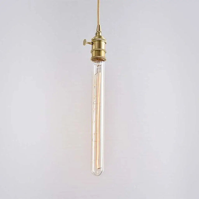 Vintage-style pendant light with brass fixture on a plain background