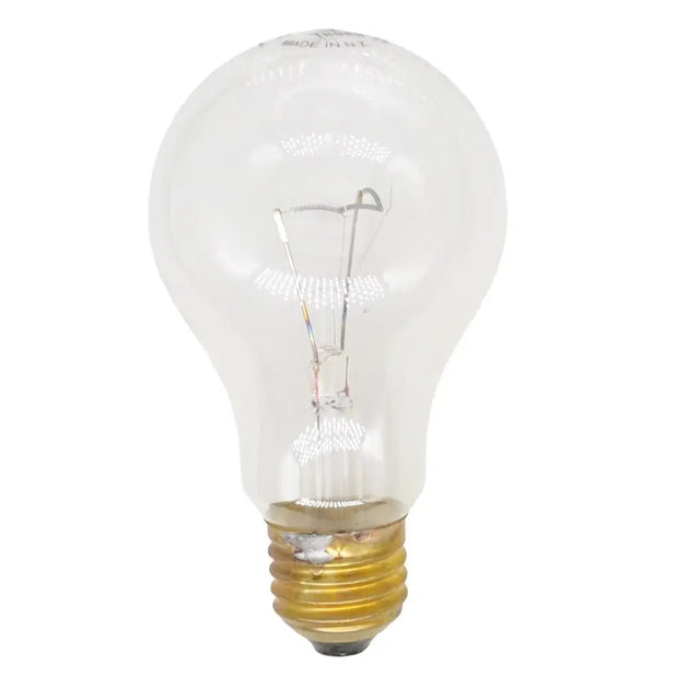 Clear light bulb with gold base on a white background