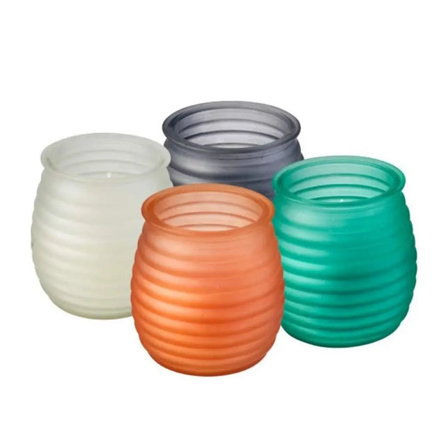 Four colorful glass jars with ribbed design on a white background