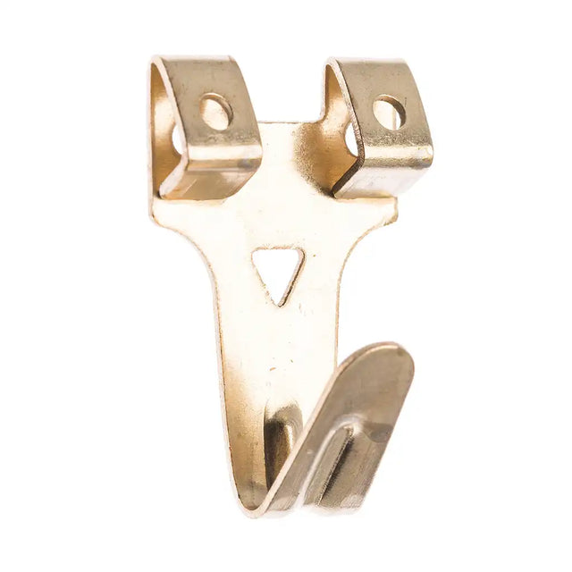 Gold metal clip on a white background