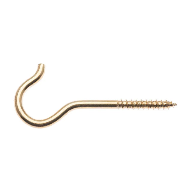 Gold metal hook on a white background