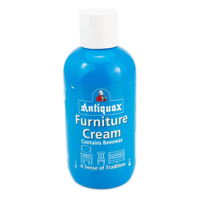 Blue bottle of Antiquax Furniture Cream with a white cap on a white background
