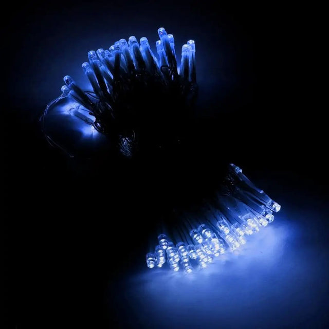 Blue LED string lights on a black background