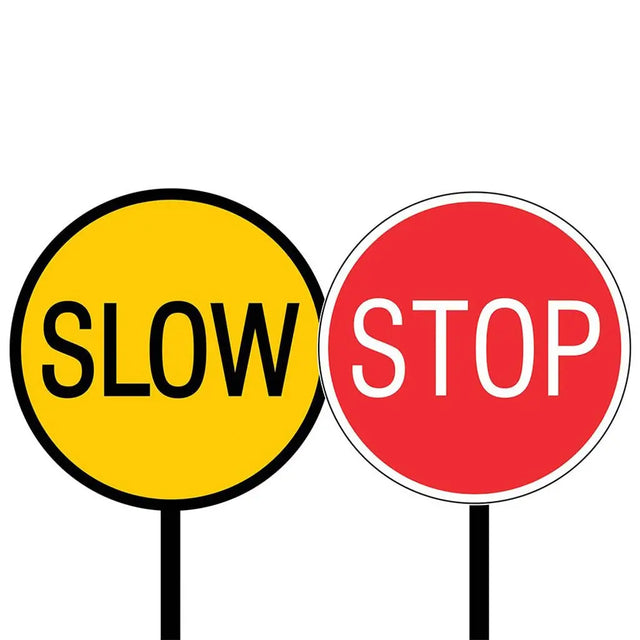 Yellow 'SLOW' sign and red 'STOP' sign on a white background