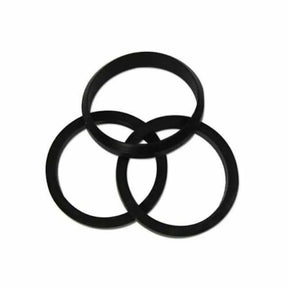 Three black rubber O-rings stacked on a white background