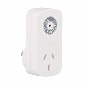 White electrical outlet with surge protector label on a white background