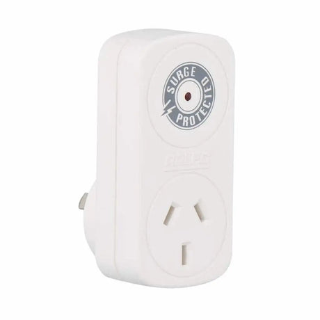 White electrical outlet with surge protector label on a white background