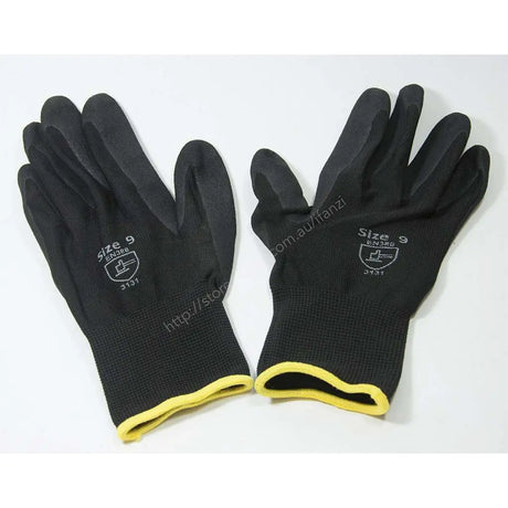 A pair of black work gloves with yellow trim at the cuffs, shown against a plain white background.